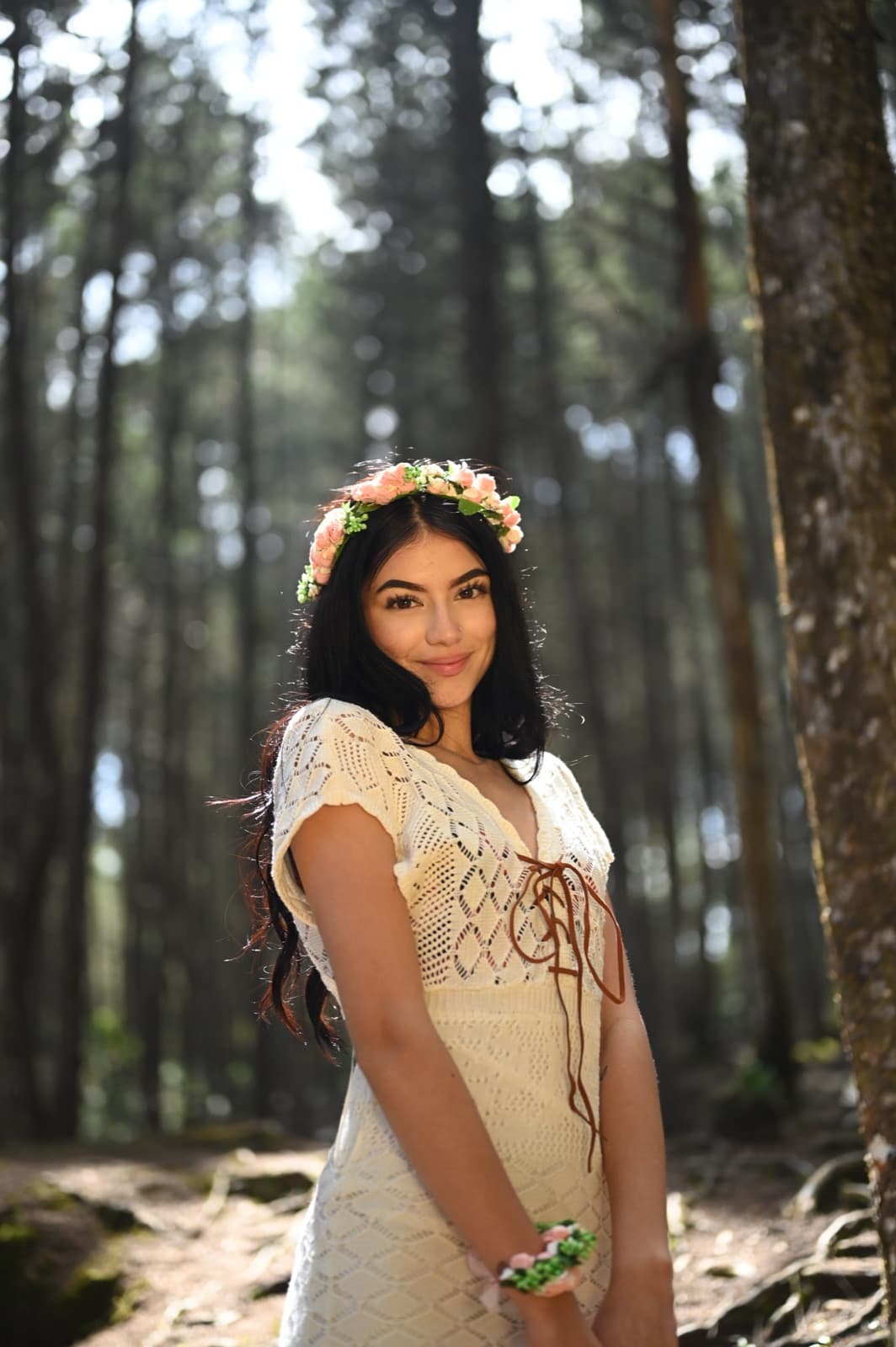 Editorial portrait of Fergie photographed among pine trees in Guarne, Antioquia.