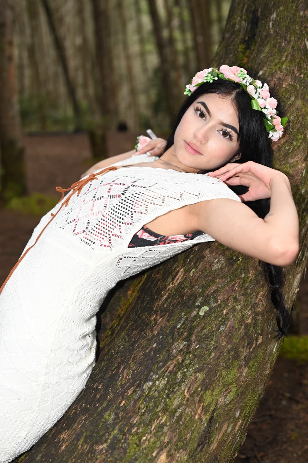 Editorial portrait of Fergie photographed among pine trees in Guarne, Antioquia.