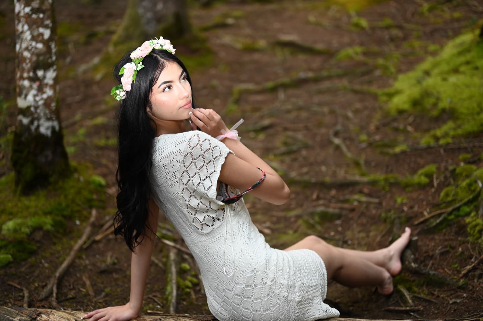 Editorial portrait of Fergie photographed among pine trees in Guarne, Antioquia.