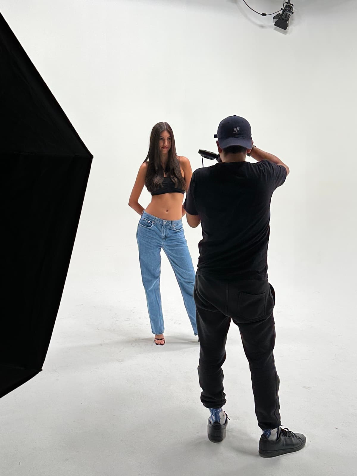 Luis Ricardo photographing a model at Rirod Studio in Miami.